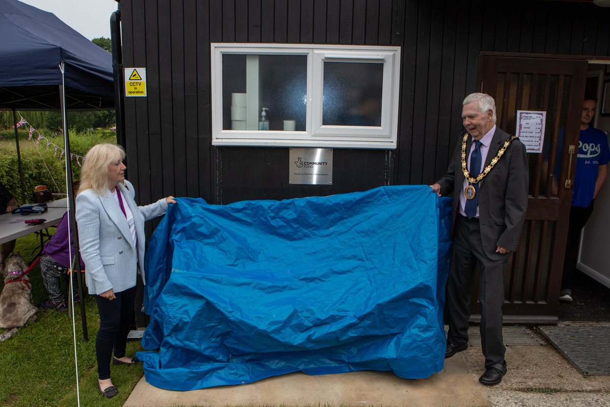 The Mayor & Mayoress unveiling our Platinum Jubilee Bench outside the Village Hall